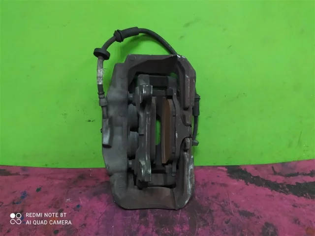 Суппорт передний левый для Audi A6 C7 2010-2018 на фотографиях