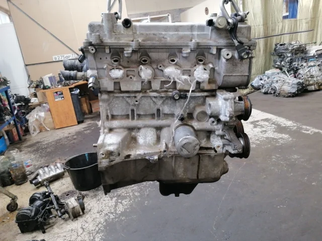 Двигатель без навесного для Mazda Familia Y12 Универсал 2007-2018 на фотографиях