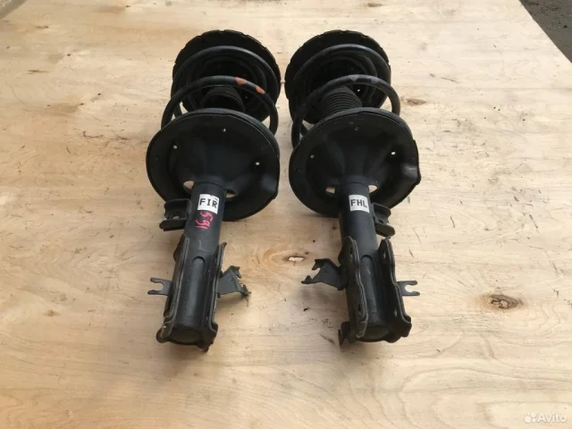 Амортизатор передний левый для Nissan Teana J31 2003-2007 на фотографиях