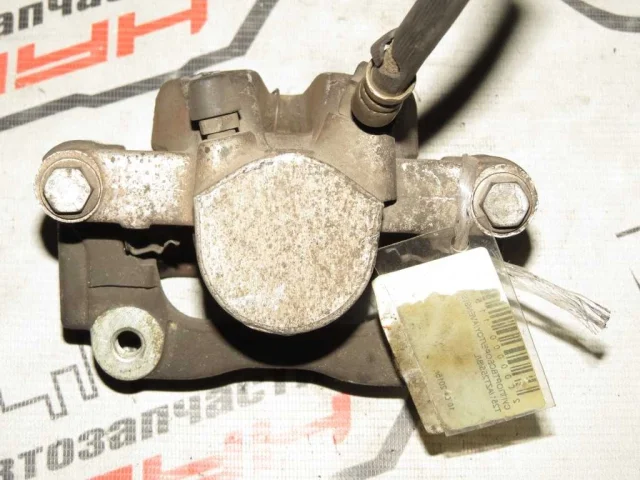 Суппорт задний левый для Toyota Avensis Седан T250 2003-2008 на фотографиях