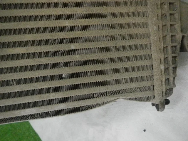 Интеркулер левый для Audi Q8 4M 2018-2023 на фотографиях