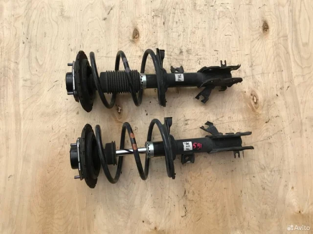 Амортизатор передний левый для Nissan Teana J31 2003-2007 на фотографиях