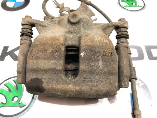 Суппорт передний левый для Skoda Octavia A7 на фотографиях