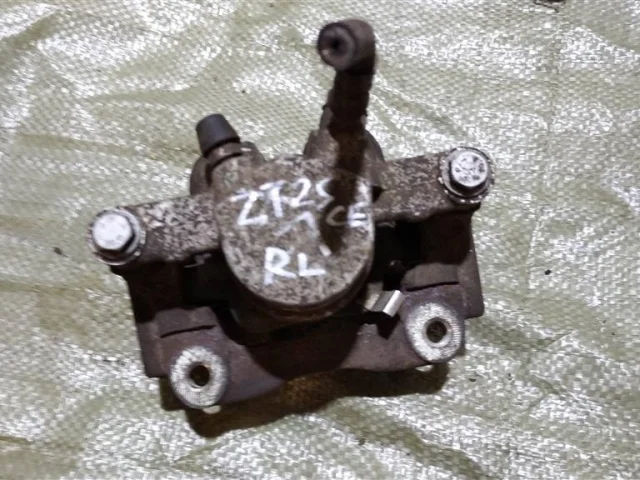 Суппорт задний левый для Toyota Avensis Седан T250 2003-2008 на фотографиях