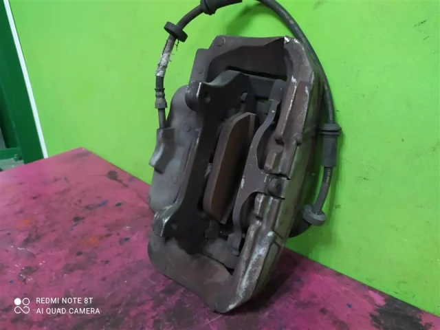 Суппорт передний левый для Audi A6 C7 2010-2018 на фотографиях