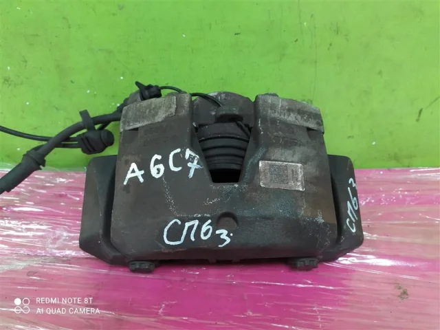 Суппорт передний левый для Audi A6 C7 2010-2018 на фотографиях