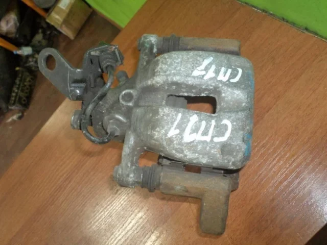 Суппорт задний левый для Skoda Octavia A5 на фотографиях