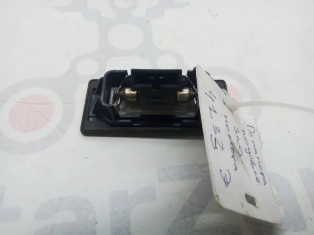 Фонарь подсветки номера правый для Volkswagen Passat Variant (B6, Typ 3C) 2004-2010 на фотографиях