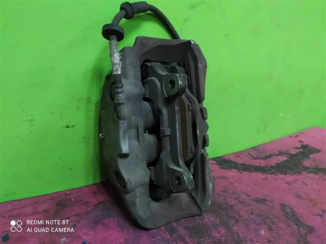 Суппорт передний левый для Audi A6 C7 2010-2018 на фотографиях