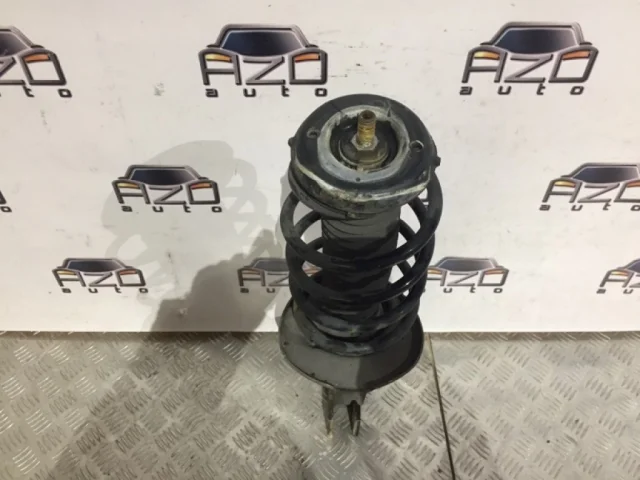 Амортизатор передний левый для Peugeot 308 SW T7 2007-2014 на фотографиях