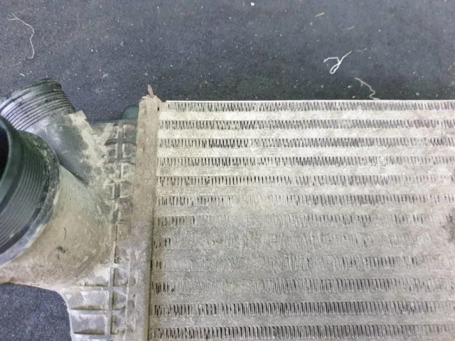 Интеркулер левый для Audi Q8 4M 2018-2023 на фотографиях