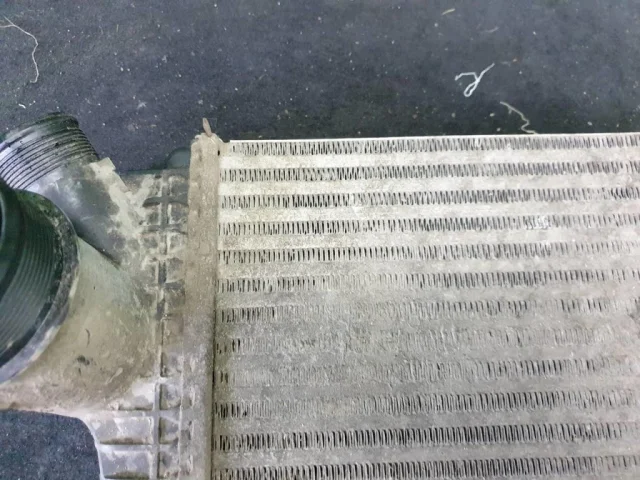 Интеркулер левый для Audi Q8 4M 2018-2023 на фотографиях