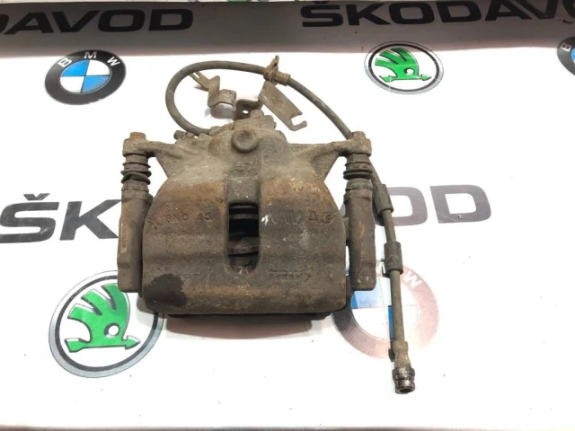 Суппорт передний левый для Skoda Octavia A7 на фотографиях