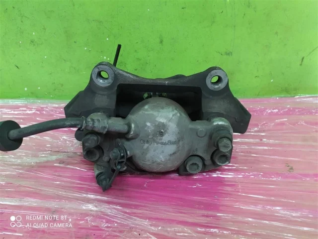 Суппорт передний левый для Audi A6 C7 2010-2018 на фотографиях