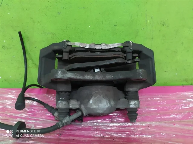 Суппорт передний левый для Audi A6 C7 2010-2018 на фотографиях