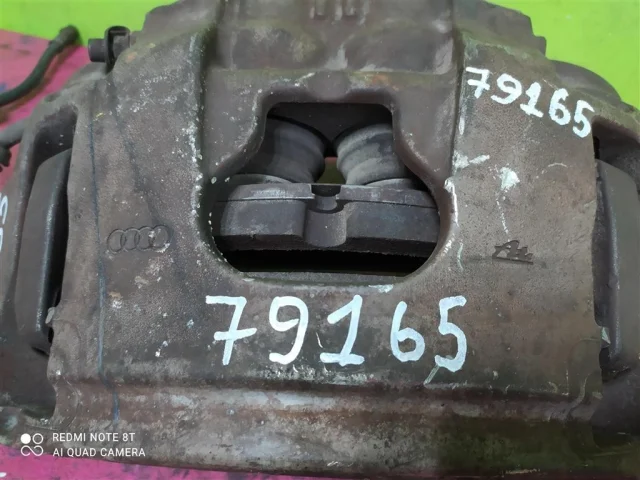 Суппорт передний левый для Audi A6 C7 2010-2018 на фотографиях