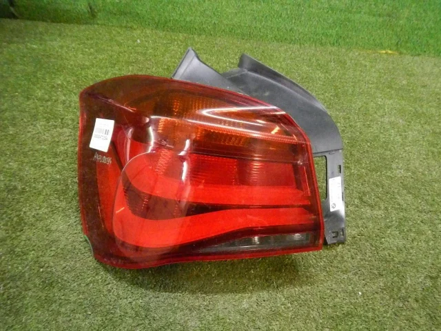 Фонарь внешний левый для BMW 1er Ф20 rest.1 2015-2020 на фотографиях