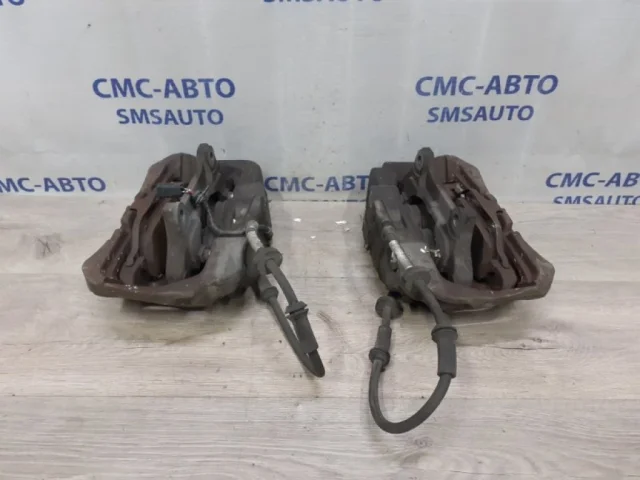 Суппорт передний левый для Audi A6 C7 2010-2018 на фотографиях