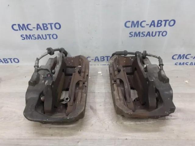 Суппорт передний левый для Audi A6 C7 2010-2018 на фотографиях