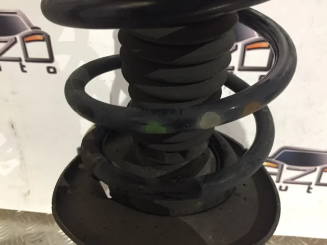 Амортизатор передний левый для Peugeot 308 SW T7 2007-2014 на фотографиях