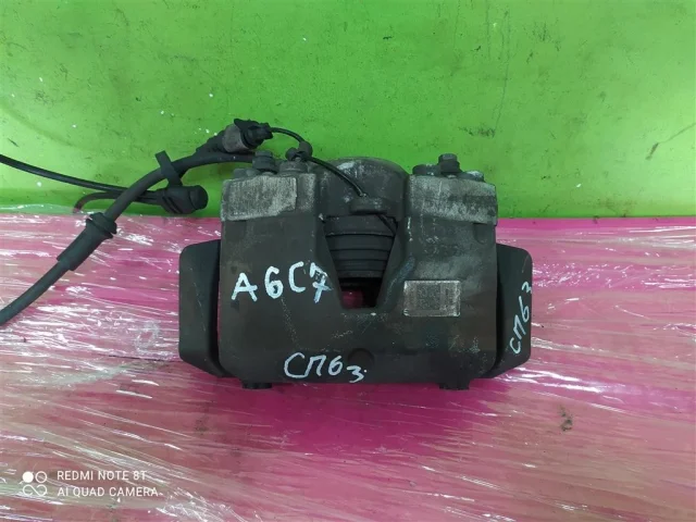 Суппорт передний левый для Audi A6 C7 2010-2018 на фотографиях