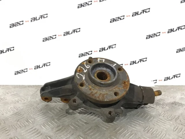 Кулак поворотный левый для Peugeot 308 SW T7 2007-2014 на фотографиях