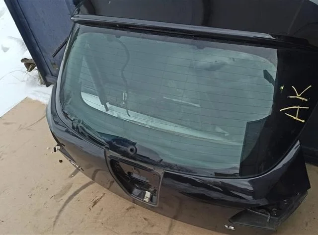 Крышка багажника для Opel Astra J Sports Tourer 2009-2017 на фотографиях