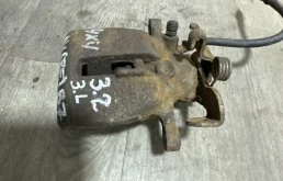 Суппорт задний левый для Audi A4 на фотографиях