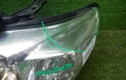 Фара ксенон левая для Toyota Land Cruiser 2009 года на фотографиях