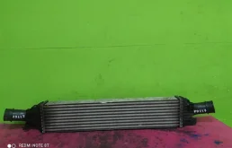 Радиатор интеркулера для Audi A4 2008 года на фотографиях