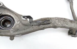 Кулак поворотный левый для Audi A6 2013 года на фотографиях