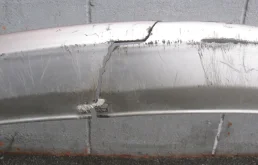 Накладка переднего бампера для Suzuki Liana 2005 года на фотографиях