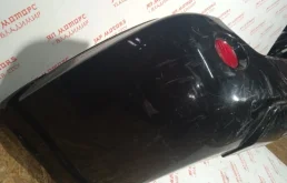 Бампер задний для Nissan X-Trail 2000 года на фотографиях