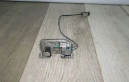 Замок капота левый для BMW X5 на фотографиях