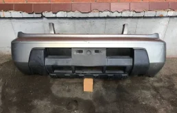 Бампер передний для Nissan X-Trail 2000 года на фотографиях