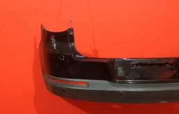 Фартук (спойлер) заднего бампера для Volkswagen Tiguan 2010 года на фотографиях