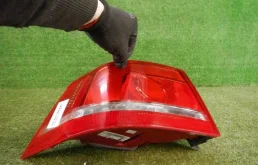 Фонарь внешний левый для Volkswagen Passat 2012 года на фотографиях