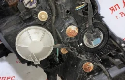 Фара левая для Nissan Teana 2010 года на фотографиях