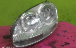 Фара левая для Volkswagen Jetta 2009 года на фотографиях