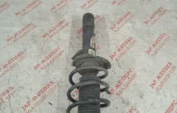 Амортизатор передний правый для Volkswagen Tiguan 2014 года на фотографиях