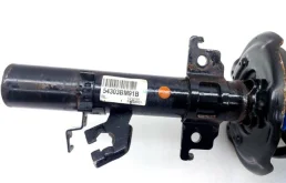 Амортизатор передний левый для Nissan Qashqai 2015 года на фотографиях