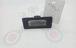 Фонарь подсветки номера правый для Volkswagen Passat 2010 года на фотографиях