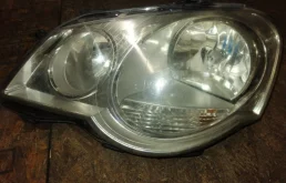 Фара ксенон левая для Volkswagen Polo 2009 года на фотографиях
