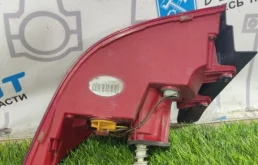 Фонарь внешний левый для Volkswagen Passat 2012 года на фотографиях