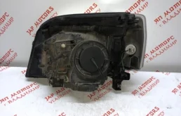 Фара ксенон левая для Nissan X-Trail 2004 года на фотографиях