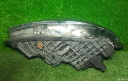 Фара ксенон левая для Nissan Qashqai 2008 года на фотографиях