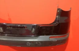 Фартук (спойлер) заднего бампера для Volkswagen Tiguan 2010 года на фотографиях