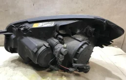 Фара ксенон левая для Nissan Qashqai 2008 года на фотографиях