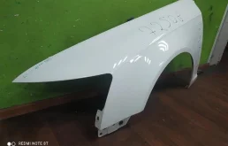 Крыло левое для Audi A6 2010 года на фотографиях