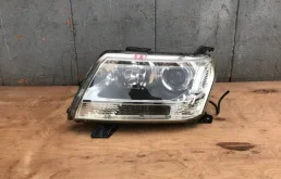 Фара левая для Suzuki Grand Vitara 2015 года на фотографиях